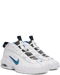 Chaussures de sport en cuir blanches Nike