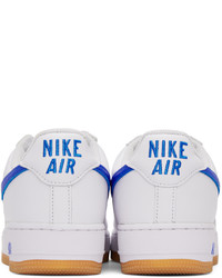 Chaussures de sport en cuir blanches Nike