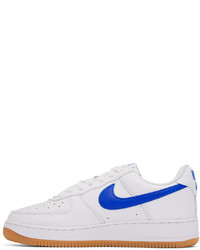 Chaussures de sport en cuir blanches Nike