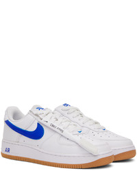 Chaussures de sport en cuir blanches Nike