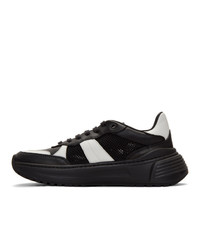 Chaussures de sport en cuir noires et blanches Bottega Veneta