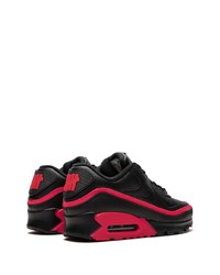 Chaussures de sport en cuir noires Nike