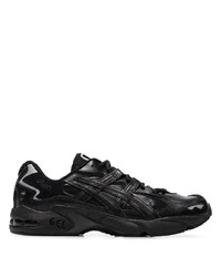 Chaussures de sport en cuir noires Asics