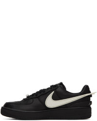 Chaussures de sport en cuir noires Nike