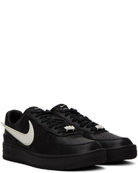 Chaussures de sport en cuir noires Nike