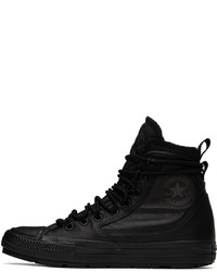 Chaussures de sport en cuir noires Converse