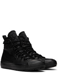 Chaussures de sport en cuir noires Converse