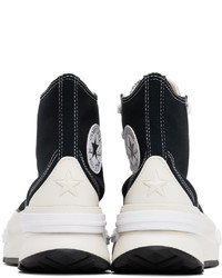 Chaussures de sport en cuir noires Converse