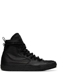 Chaussures de sport en cuir noires Converse