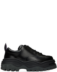 Chaussures de sport en cuir noires Eytys