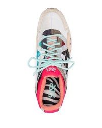 Chaussures de sport en cuir noires Asics