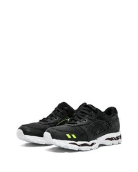 Chaussures de sport en cuir noires Asics