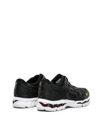 Chaussures de sport en cuir noires Asics