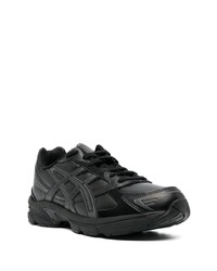 Chaussures de sport en cuir noires Asics