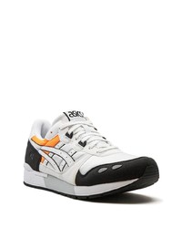 Chaussures de sport en daim blanches Asics