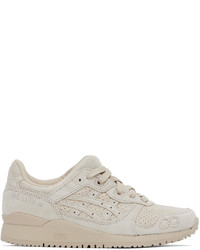 Chaussures de sport en daim grises Asics