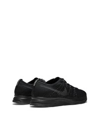 Chaussures de sport en toile noires Nike