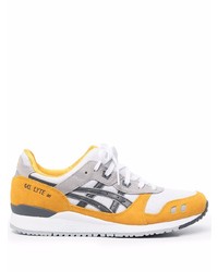 Chaussures de sport grises Asics