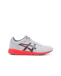 Chaussures de sport grises Asics