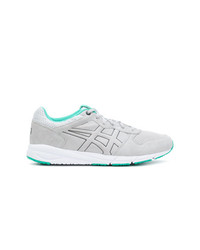 Chaussures de sport grises Asics