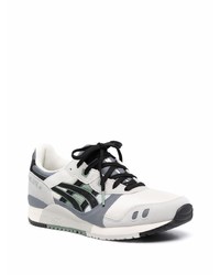 Chaussures de sport grises Asics