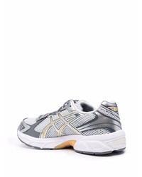 Chaussures de sport grises Asics