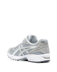 Chaussures de sport grises Asics