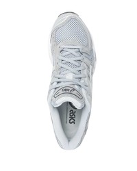 Chaussures de sport grises Asics