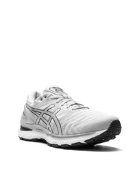 Chaussures de sport grises Asics