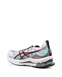 Chaussures de sport grises Asics