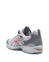 Chaussures de sport grises Asics