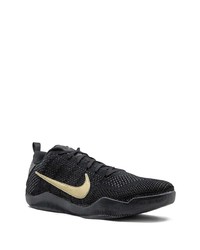 Chaussures de sport noir et doré Nike