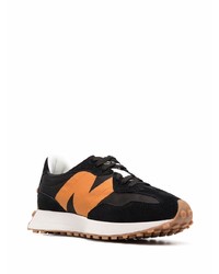 Chaussures de sport noir et orange New Balance