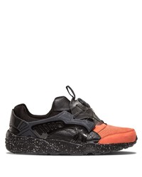Chaussures de sport noir et orange Puma