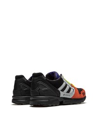 Chaussures de sport noir et orange adidas