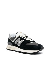 Chaussures de sport noires et blanches New Balance