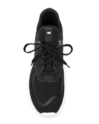 Chaussures de sport noires et blanches New Balance