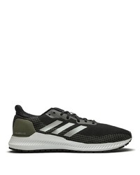 Chaussures de sport noires et blanches adidas