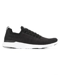 Chaussures de sport noires et blanches APL Athletic Propulsion Labs