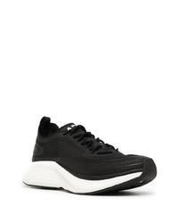 Chaussures de sport noires et blanches APL Athletic Propulsion Labs