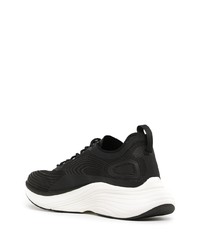 Chaussures de sport noires et blanches APL Athletic Propulsion Labs