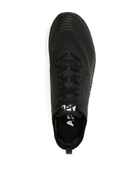 Chaussures de sport noires et blanches APL Athletic Propulsion Labs