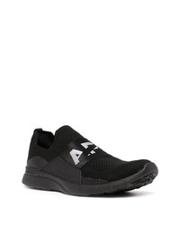 Chaussures de sport noires et blanches APL Athletic Propulsion Labs