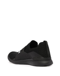 Chaussures de sport noires et blanches APL Athletic Propulsion Labs