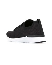 Chaussures de sport noires et blanches APL Athletic Propulsion Labs