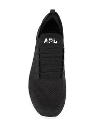 Chaussures de sport noires et blanches APL Athletic Propulsion Labs