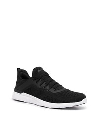 Chaussures de sport noires et blanches APL Athletic Propulsion Labs