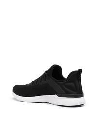 Chaussures de sport noires et blanches APL Athletic Propulsion Labs