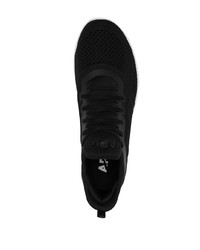 Chaussures de sport noires et blanches APL Athletic Propulsion Labs