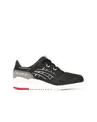 Chaussures de sport noires et blanches Asics